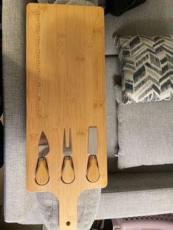Bamboo charcuterie and cheese board with 3 cheese tools