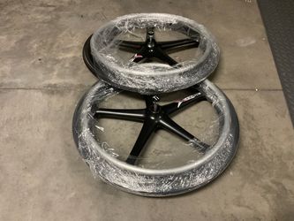 Xcore 24” wheelchair wheels with tires and Tilite axles.