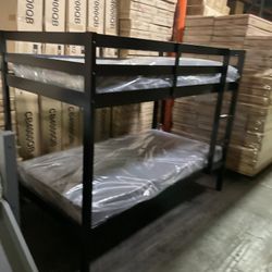 Twin bunk bed. Comes in espresso. Assembly required. Assembly not included. Taxes included. Free delivery.  Bunk bed only-$220 Bunk bed with mattresse