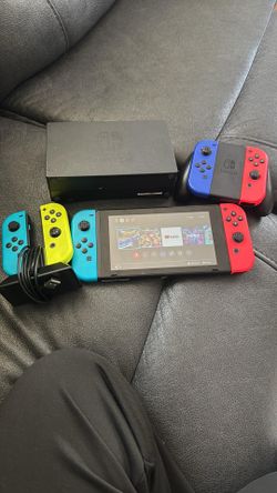 Nintendo Switch with Neon Blue and Neon Red Joy‑Con