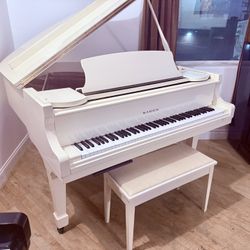 White Baby Grand Piano