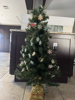 45” Fiber Optic Pre Light snow flake cluster tree . Operates from a single bulb in the base and changes colors . 