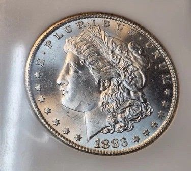 Carson City Mint 1883 CC Morgan Silver Dollar $1. Blast White
