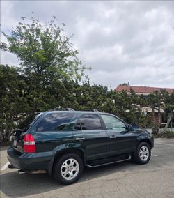 2002 Accura MDX 
Automatic 
runs very good 
no isues
Clean title
SMOG DONE
AC WORK
2 new tires
smog done
Factory Rear Diff Locker
ac cold
OVER 200KXXX