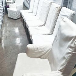 8 white upholstered dining chairs with removable