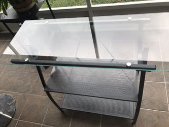 Nice steel shelving with glass top