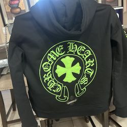 selling denim tear sweater green and black