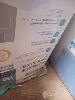 Portable air conditioner with hose for the window