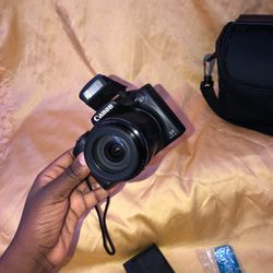 Canon Camera (Bag, Battery, & Memory Card included)