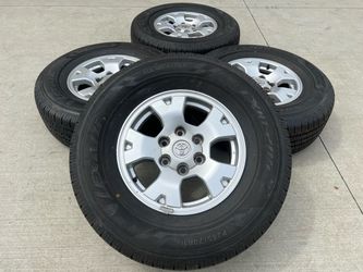 Toyota OEM Wheels with All Weather Tires P265/70R16