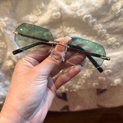 Green colored sunglasses 