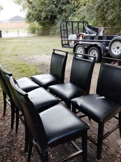 Refrigerator and chairs