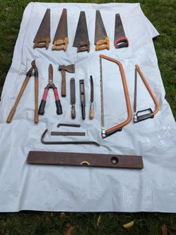 Mixed lot of Vintage Hand Tools Hand Saw Bow Saw Branch Cutters Axe & more