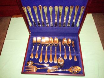 65 piece gold plated silverware set new