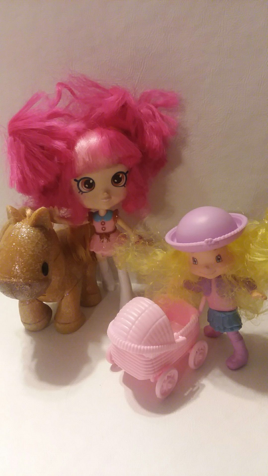 Small dolls and horse