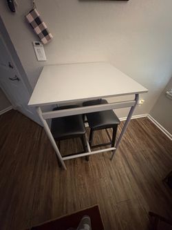 2 seat high table with leather barstools