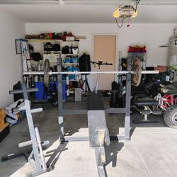 Weight bench, Rack, 45 lb Bar, Weight Tree and 2 45 lb Plates