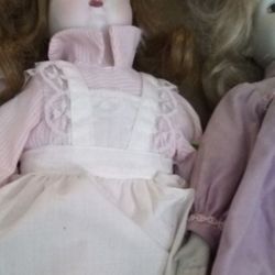A Pair Of Vintage Porcelain Dolls 