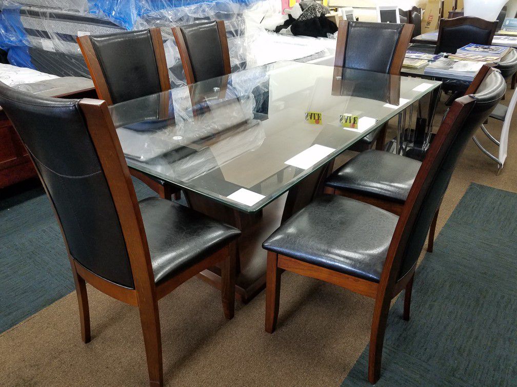 New glass top dining table set with 6 chairs