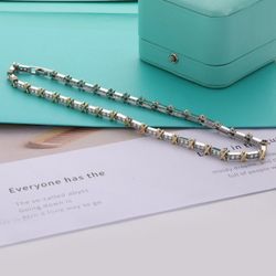 Tiffany's new cross-shaped diamond necklace