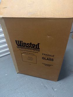Winsted 64032 6U rack cabinet in black.
