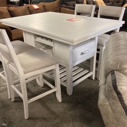 Brand new table in for stools $1000