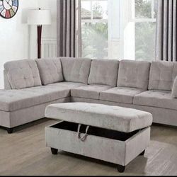 COSTCO Gray chenille sectional couch and ottoman