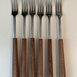 Vintage set of 6 steak/dinner forks made in Switzerland by Wenger (marked “Wengerinox”).