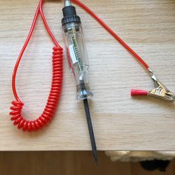 Probador de circuito para automóvil con pinza tipo caimán.