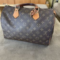 gently used louis vuitton bag