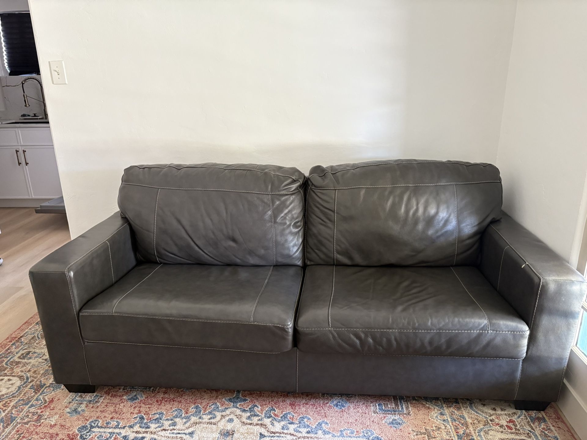 🛋 Ashley Furniture Morelos Gray Leather Sofa – Good Cond