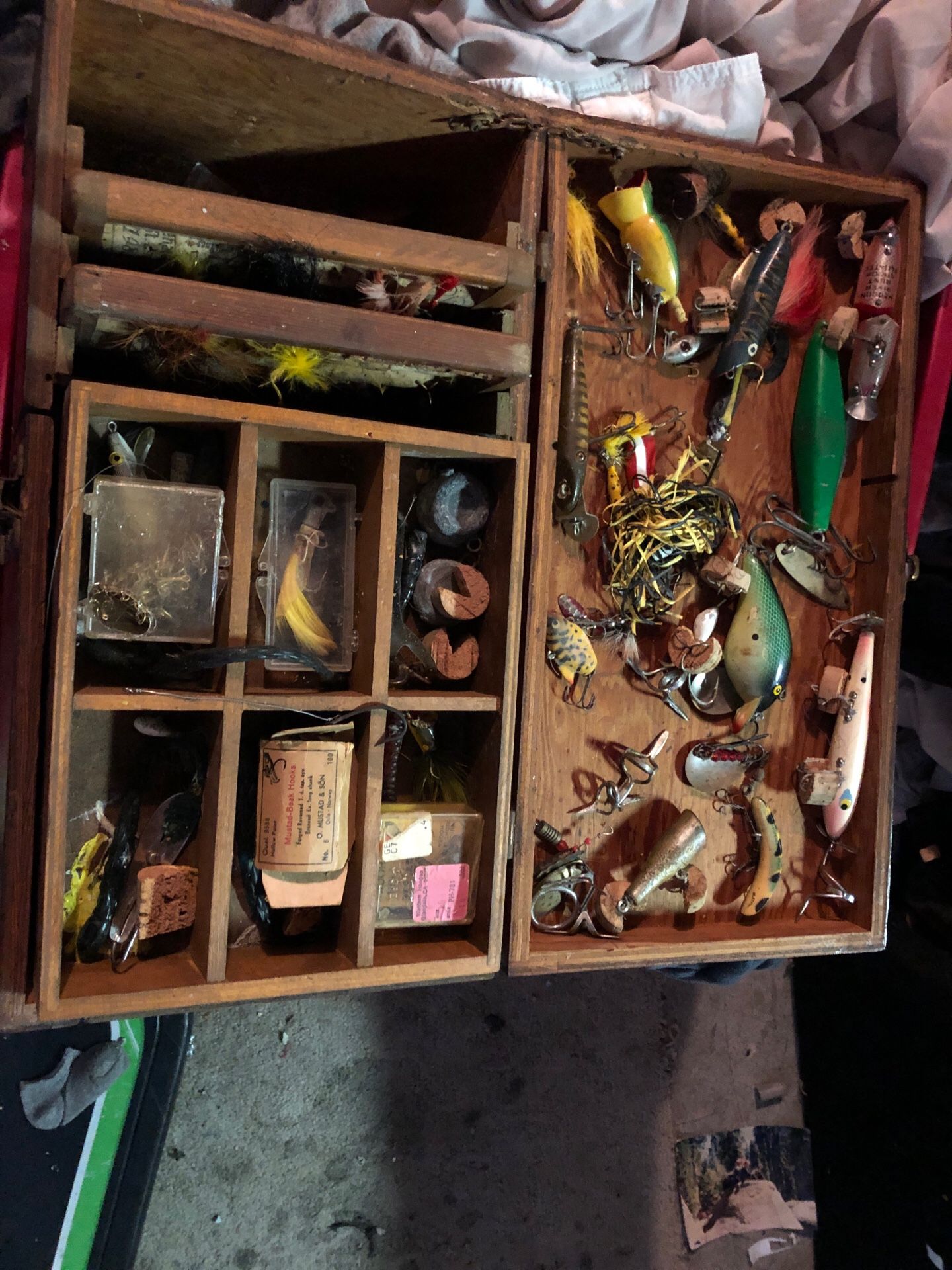 Fishing equipment plus a unique wooden tackle box and two rods
