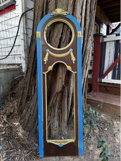 Old grandfather clock door  hand painted. Can be turned into a mirror . Or used as an art accent piece
