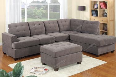 Grey waffle suede sectional with matching ottoman!
