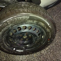 TIRE WITH WHEEL RIM 225 65 17 . PERFECT CONDITION 