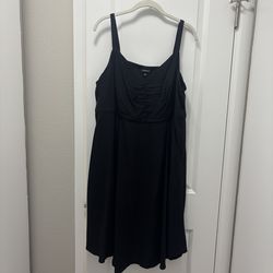 Barely worn Torrid mini black dress w/ pockets