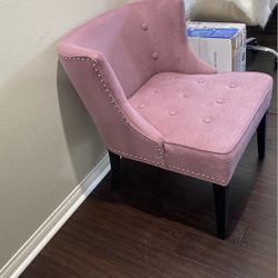 A Set Of Two Chairs