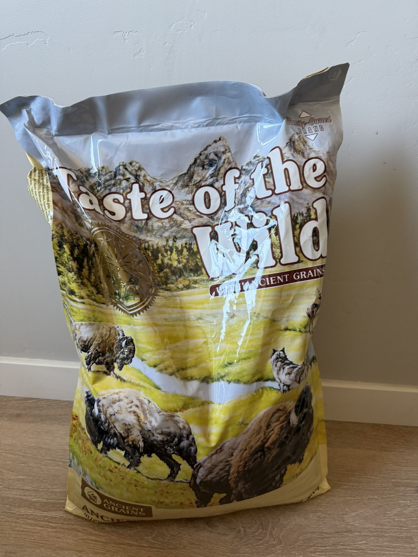 Two 28 pound bags of taste of the wild dog food