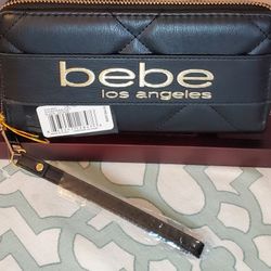 bebe Los Angeles Zippered Wallet.