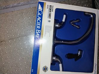 Glacier Bay Curved Handle Kitchen Faucet with Sprayer pickup only cash