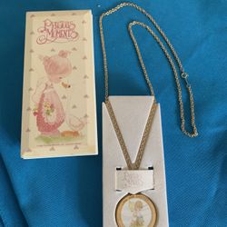 Precious Moments. 1998.   Avon Watch Pendant.  Chino, Ca 