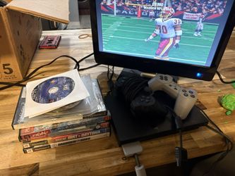 Ps2 with lots of games an 2 controller 