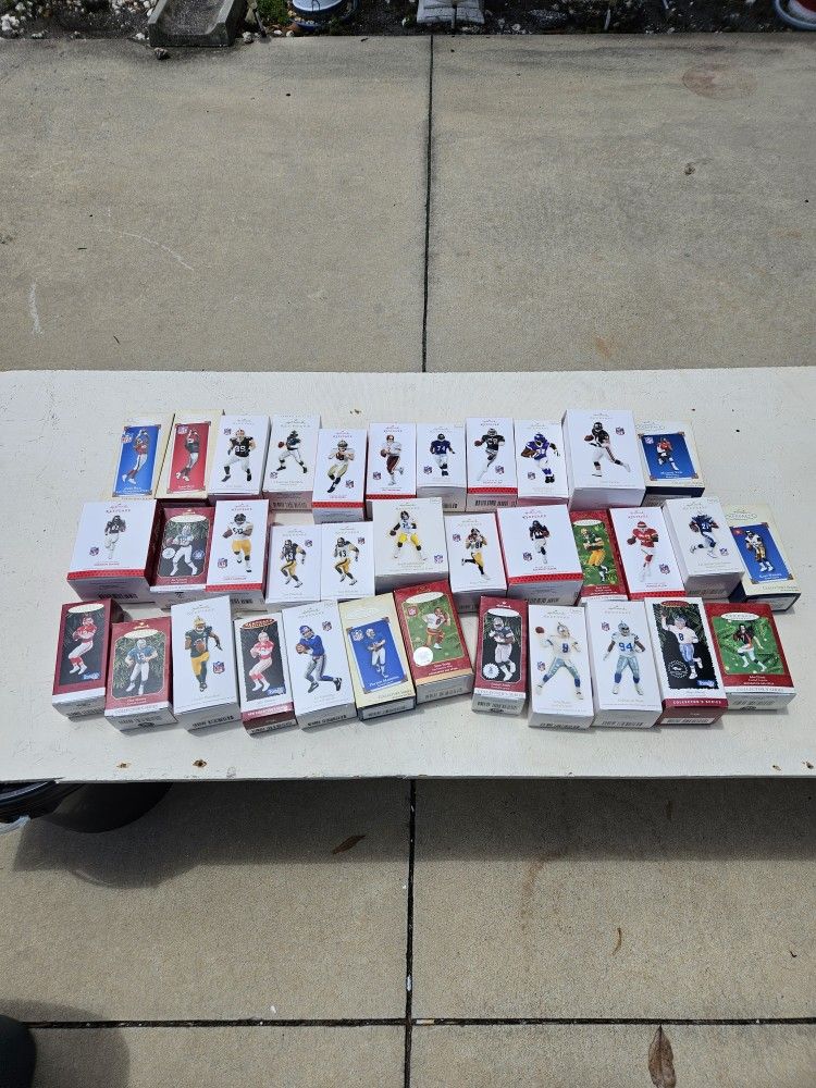 Hallmark collectible sports ornaments.