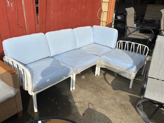 Outdoor Sectional Sofa with Light Blue Cushions