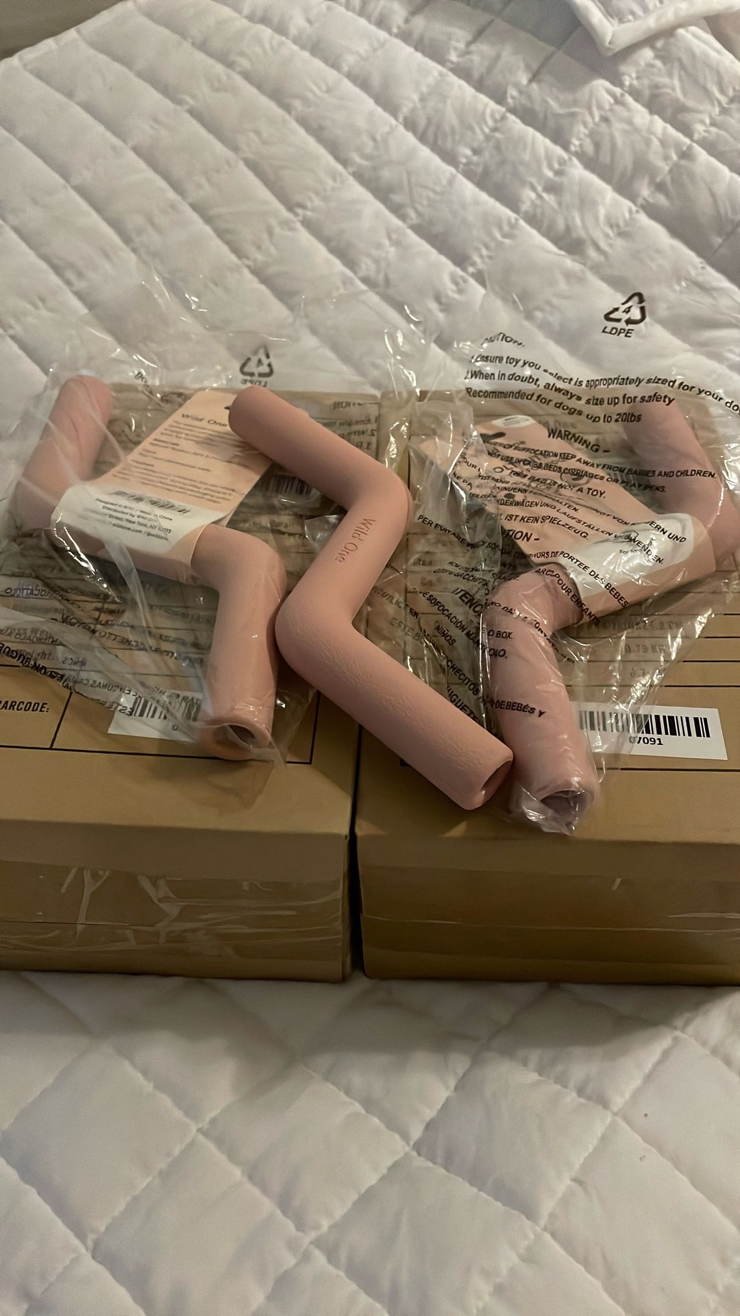 Two Boxes Of Wild One Bolt Dog Toy