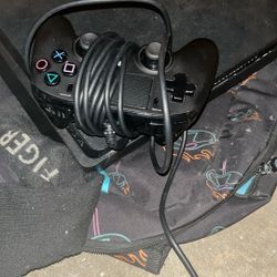 A PS4 With A Wired Controller 