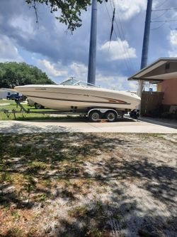 2000 Sea Rey 230 Timon al lado