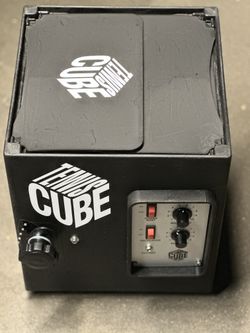 Tennis ball machine.  The Cube from Sports Tutor