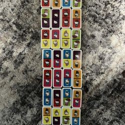 Sanrio Hello Kitty Dominoes - 28 High-Quality Dominoes in Decorative Tin