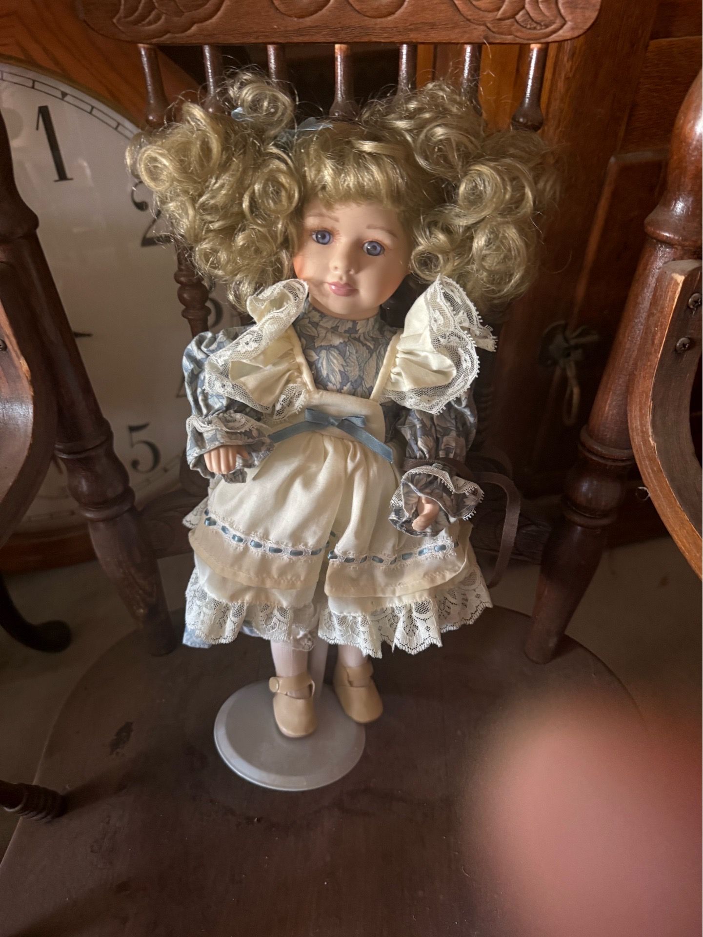 porcelain doll with Victorian-style dress.